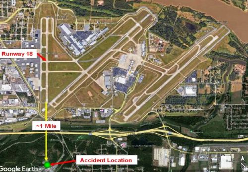 Accident location (green dot) in reference to runway 18 at LIT.